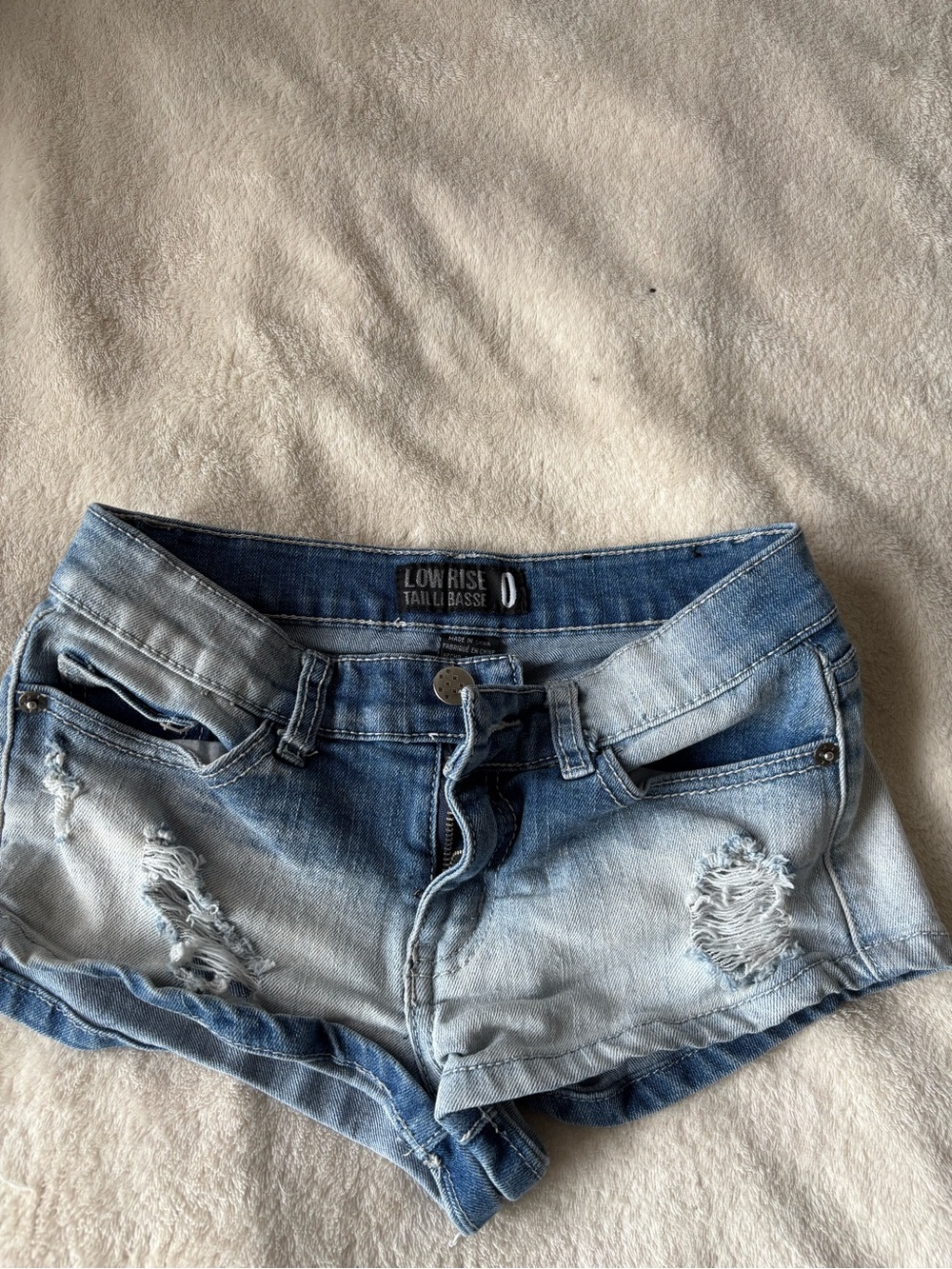 3/20$ - Low Rise Denim Shorts
